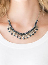 Load image into Gallery viewer, Infused with silver chain, blue pearls are threaded along an invisible wire below the collar. Matching blue pearls and glittery white rhinestones swing from the pearly strand, creating a flirtatious fringe below the collar. Features an adjustable clasp closure.  Sold as one individual necklace. Includes one pair of matching earrings.  Always nickel and lead free.