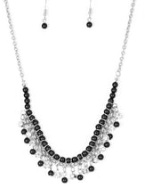 Load image into Gallery viewer, Infused with silver chain, shiny black beads are threaded along an invisible wire below the collar. Matching black beads and glittery white rhinestones swing from the pearly strand, creating a flirtatious fringe below the collar. Features an adjustable clasp closure.  Sold as one individual necklace. Includes one pair of matching earrings.