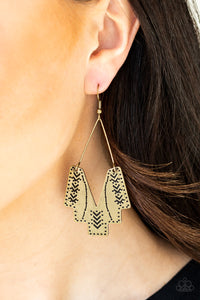 Stamped in tribal inspired patterns, an abstract geometric frame swings from a brass wire fitting for a tribal inspired look. Earrings attaches a standard fishhook fittings.  Sold as one pair of earrings.  Always nickel and lead free.