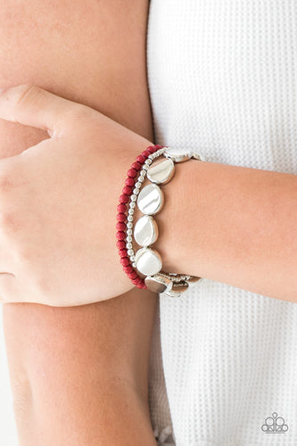 Mismatched silver and red beads and round silver accents are threaded along stretchy bands, creating colorful layers around the wrist.  Sold as one set of three bracelets.   Always nickel and lead free.