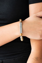 Load image into Gallery viewer, Infused with dainty silver accents, a collection of colorful natural stones are threaded along a stretchy band. A glistening silver frame engraved with the word, "blessed" adorns the center for a seasonal finish. Sold as one individual bracelet.  Always nickel and lead free.