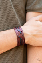 Load image into Gallery viewer, Brown and black leather laces are haphazardly threaded through a thick brown leather band, creating a rustic display around the wrist. Features an adjustable snap closure.  Sold as one individual bracelet.  Always nickel and lead free. 