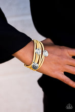 Load image into Gallery viewer, Strung between two silver accents, skinny strips of yellow suede layer across the wrist in a seasonal fashion. Dainty silver charms featuring shimmery scratch surfaces and a whimsical dandelion pattern swing from the wrist for a wanderlust finish. Features an adjustable clasp closure.  Sold as one individual bracelet.  Always nickel and lead free.