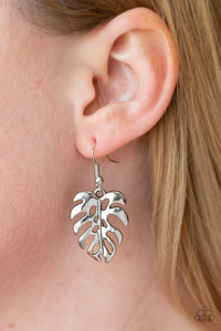 Brushed in a high-sheen finish, a silver palm leaf dangles from the ear for a summery look. Earring attaches to a standard fishhook fitting.  Sold as one pair of earrings.  Always nickel and lead free.