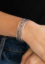 Load image into Gallery viewer, Dotted in ornate silver beads, textured silver wires layer between two smooth silver bars, stacking into an edgy cuff around the wrist.  Sold as one individual bracelet.  Always nickel and lead free.