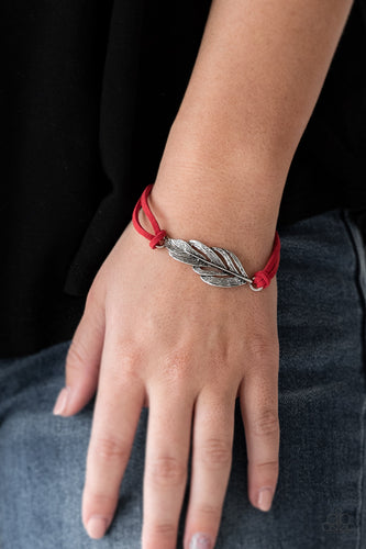 Strands of fiery red suede knot around a shimmery silver feather charm, creating a seasonal pendant atop the wrist. Features an adjustable clasp closure.  Sold as one individual bracelet.  Always nickel and lead free.