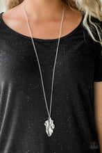 Load image into Gallery viewer, Necklace and complimentary earrings #1: An elongated silver chain gives way to a rippling silver leaf-like pendant for a seasonal look. Features an adjustable clasp closure.    Earrings #2:  Brushed in a high-sheen finish, a rippling silver leaf-like frame falls from the ear for a seasonal look. Earring attaches to a standard fishhook fitting  Sold as one individual necklace and 2 pairs of earrings.  Always nickel and lead free.