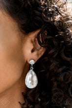 Load image into Gallery viewer, An exaggerated teardrop-shaped rhinestone swings from the bottom of a classic white rhinestone, creating a dramatically glamorous lure. Earring attaches to a standard post fitting.