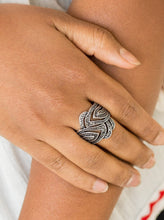 Load image into Gallery viewer, Dotted in shimmery studs, a flame-like silver frame folds across the finger. Glittery hematite rhinestones are sprinkled down the center for a sparkling finish. Features a stretchy band for a flexible fit.  Sold as one individual ring.  Always nickel and lead free.