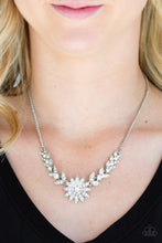 Load image into Gallery viewer, Encrusted in glassy white rhinestones, glittery leafy frames give way to a blooming silver frame encrusted in dazzling white rhinestones below the collar for a sparkling seasonal finish. Features an adjustable clasp closure.  Sold as one individual necklace. Includes one pair of matching earrings.  Always nickel and lead free.