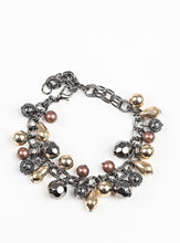 Load image into Gallery viewer, Necklace and Earrings:  Featuring shiny, faceted, and mesh finishes, mismatched copper, gold, and gunmetal beads trickle below the collar for an edgy industrial look. Features an adjustable clasp closure.  Bracelet:  Featuring shiny, faceted, and mesh finishes, mismatched copper, gold, and gunmetal beads trickle from the wrist for an edgy industrial look. Features an adjustable clasp closure.  Sold as one individual necklace, earrings, and bracelet.