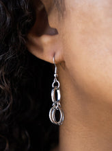 Load image into Gallery viewer,  Bold and unapologetic, this hefty necklace gives off a hand-made feel with its multiple strands of black cording held together by industrial silver fittings that shift and slide. Features an adjustable clasp closure.
