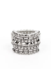 Load image into Gallery viewer, Layers of linear silver texture are accented with a single row of hematite rhinestones, adding a touch of glam to the gritty design. Features a stretchy band for a flexible fit.
