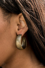 Load image into Gallery viewer, Etched in gritty linear patterns, thick brass hoops boldly curl around the ear for a statement-making finish. Earring attaches to a standard post fitting. Hoop measures approximately 1 1/4” in diameter.