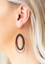 Load image into Gallery viewer, Necklace Set:  Ringed in a studded silver frame, glittery red and hematite rhinestones collect into a glamorous pendant at the bottom of a lengthened silver chain for a refined flair. Features an adjustable clasp closure.  Bracelet:  Ringed in a studded silver frame, glittery red and hematite rhinestones collect into a glittery lure for a refined flair. Earring attaches to a standard fishhook fitting.  Sold as one individual necklace, set of earrings, and bracelet.