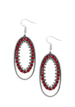 Load image into Gallery viewer, Necklace Set:  Ringed in a studded silver frame, glittery red and hematite rhinestones collect into a glamorous pendant at the bottom of a lengthened silver chain for a refined flair. Features an adjustable clasp closure.  Bracelet:  Ringed in a studded silver frame, glittery red and hematite rhinestones collect into a glittery lure for a refined flair. Earring attaches to a standard fishhook fitting.  Sold as one individual necklace, set of earrings, and bracelet.