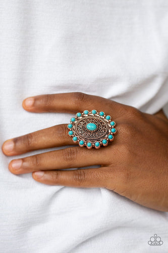 Embossed in dizzying floral details, a shimmery copper frame is dotted with refreshing turquoise stone accents for a seasonal look. Features a stretchy band for a flexible fit.  Sold as one individual ring.  Always nickel and lead free