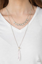 Load image into Gallery viewer, Delicately etched in shimmer, dainty silver discs swing from the uppermost chain above a silver feather pendant. Refreshing white rocks swing alongside the whimsical feather, adding an earthy finish to the wanderlust palette. Features an adjustable clasp closure.  Sold as one individual necklace. Includes one pair of matching earrings.  Always nickel and lead free.