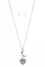 Load image into Gallery viewer, Infused with pink cat's eye accents, a dainty silver heart, rectangular frame stamped with "love", and a locket-like heart stamped with the word "mom", collect at the bottom of a silver chain for a vintage inspired look. Features an adjustable clasp closure.  Sold as one individual necklace. Includes one pair of matching earrings.