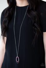Load image into Gallery viewer, Ringed in a studded silver frame, glittery pink and hematite rhinestones collect into a glamorous pendant at the bottom of a lengthened silver chain for a refined flair. Features an adjustable clasp closure.  Sold as one individual necklace. Includes one pair of matching earrings.