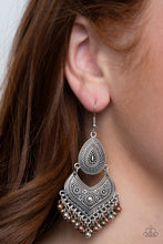 Load image into Gallery viewer, Studded and embossed in tribal inspired patterns, an antiqued silver teardrop links with a decorative silver frame. Dainty copper, brass, and silver beads swing from the bottom of the stacked lure, creating a musical fringe. Earring attaches to a standard fishhook fitting.  Sold as one pair of earrings.   Always nickel and lead free. 