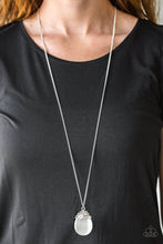 Load image into Gallery viewer, Sporadically dotted in glittery white rhinestones, dainty silver circles join around the top of a glassy white teardrop moonstone. The bubbly pendant swings from the bottom of a lengthened silver chain for a whimsical finish. Features an adjustable clasp closure.  Sold as one individual necklace. Includes one pair of matching earrings.  Always nickel and lead free.