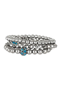 Mismatched gunmetal beads and blue rhinestone encrusted beads are threaded along stretchy bands for an edgy and refined look.  Sold as one set of three bracelets.  ﻿Always nickel and lead free.