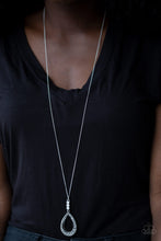 Load image into Gallery viewer, Infused with a lengthened silver chain, three white rhinestones give way to a glittery teardrop pendant. Dotted with dainty silver studs, the inside and outside of a silver teardrop is encrusted in white rhinestones for a regal look. Features an adjustable clasp closure.  Sold as one individual necklace. Includes one pair of matching earrings.  Always nickel and lead free.