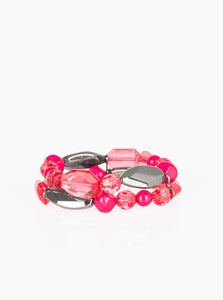 Mismatched gunmetal, polished pink, and crystal-like beads are threaded along interlocking stretchy bands for a whimsical look.  Sold as one individual bracelet.