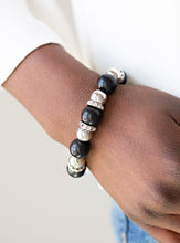 Load image into Gallery viewer, Necklace and Earrings:  A collection of faux black stones, shiny silver beads, and white rhinestone encrusted rings join below the collar in a refined fashion. Features an adjustable clasp closure.  Bracelet:  Faux black stones, shiny silver beads, and white rhinestone encrusted rings are threaded along a stretchy band and wrapped around the wrist for a refined look.