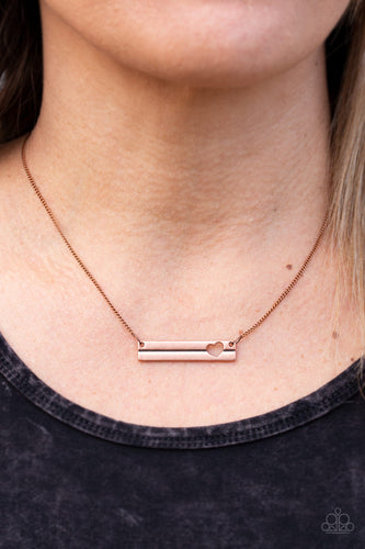 Featuring an airy heart cutout, a dainty copper frame is suspended horizontally below the collar for a charming look. Features an adjustable clasp closure.  Sold as one individual necklace. Includes one pair of matching earrings.  Always nickel and lead free. 