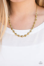 Load image into Gallery viewer, ﻿Necklace and Earrings: Oversized aurum rhinestones are sprinkled along an antiqued brass chain, creating bold shimmer below the collar. Features an adjustable clasp closure. ﻿ Bracelet: Oversized aurum rhinestones are sprinkled along an antiqued brass chain, creating bold shimmer around the wrist. Features an adjustable clasp closure.  Sold as one individual necklace, earrings and bracelet.  Always nickel and lead free.
