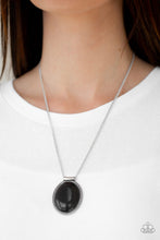 Load image into Gallery viewer, A smooth black stone is pressed into a textured silver frame, creating a bold seasonal pendant below the collar. Features an adjustable clasp closure.  Sold as one individual necklace. Includes one pair of matching earrings.  Always nickel and lead free.