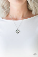 Load image into Gallery viewer, Alternating in silver studs and glassy white rhinestones, dainty silver bars fold around a sparkling mishmash of glassy white rhinestones and dainty green pearls. The sparkling pendant swings below the collar for a timeless look. Features an adjustable clasp closure.  Sold as one individual necklace. Includes one pair of matching earrings.  Always nickel and lead free.