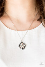 Load image into Gallery viewer, Alternating in silver studs and glassy white rhinestones, dainty silver bars fold around a sparkling mishmash of glassy white rhinestones and dainty brown pearls. The sparkling pendant swings below the collar for a timeless look. Features an adjustable clasp closure.   Sold as one individual necklace. Includes one pair of matching earrings.  Always nickel and lead free.