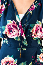 Load image into Gallery viewer, Chiseled into a smooth rectangular shape, a tranquil tiger’s eye stone pendant swings from the bottom of an elongated brass chain for a handcrafted, artisanal look. Features an adjustable clasp closure.  Sold as one individual necklace. Includes one pair of matching earrings.  Always nickel and lead free.