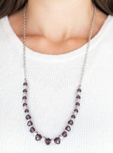 Load image into Gallery viewer, Varying in size, shiny silver beads, textured silver accents, and purple crystal-like beads are threaded along an invisible wire at the bottom of a lengthened silver chain for a refined flair. Features an adjustable clasp closure.  Sold as one individual necklace. Includes one pair of matching earrings.
