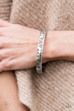 Load image into Gallery viewer, Brushed in an antiqued shimmer, decorative triangular patterns are stamped along a glistening silver bangle for a tribal inspired look.  Sold as one individual bracelet.   Sunset Sightings Fashion Fix   Always nickel and lead free.