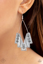 Load image into Gallery viewer, Stamped in tribal inspired patterns, an abstract geometric frame swings from a delicate silver wire fitting for a tribal inspired look. Earrings attaches a standard fishhook fittings.  Sold as one pair of earrings.  Complete the look with other pieces from the collection