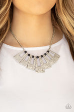 Load image into Gallery viewer, Infused with dainty black stone beads, hammered silver rectangular frames fan out below the collar for a bold seasonal look. Features an adjustable clasp closure.  Sold as one individual necklace. Includes one pair of matching earrings.  Always nickel and lead free.
