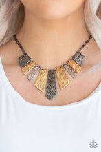 Load image into Gallery viewer, Embossed in rippling patterns, a collection of angular silver, gunmetal, and gold plates swing from the bottom of a glistening gunmetal chain, creating an edgy geometric fringe below the collar. Features an adjustable clasp closure.  Sold as one individual necklace. Includes one pair of matching earrings.  Always nickel and lead free.