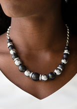 Load image into Gallery viewer, Necklace and Earrings:  A collection of faux black stones, shiny silver beads, and white rhinestone encrusted rings join below the collar in a refined fashion. Features an adjustable clasp closure.  Bracelet:  Faux black stones, shiny silver beads, and white rhinestone encrusted rings are threaded along a stretchy band and wrapped around the wrist for a refined look.
