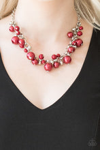 Load image into Gallery viewer, Varying in size, bubbly red pearls, classic silver beads, and shiny red beads swing from the bottom of a glistening silver chain, creating a refined fringe below the collar. Features an adjustable clasp closure.  Sold as one individual necklace. Includes one pair of matching earrings.  Always nickel and lead free.