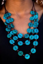 Load image into Gallery viewer, Tinted in blue finishes, shiny wooden discs trickle along shiny brown cording, creating three colorful layers below the collar. Features a button-loop closure.  Sold as one individual necklace. Includes one pair of matching  Always nickel and lead free.Tinted in blue finishes, shiny wooden discs trickle along shiny brown cording, creating three colorful layers below the collar. Features a button-loop closure.  Sold as one individual necklace. Includes one pair of matching