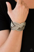 Load image into Gallery viewer, Oversized glassy white rhinestones are encrusted along strands of crisscrossing brown suede, creating a fierce shimmer around the wrist. Features an adjustable snap closure.  Sold as one individual bracelet.  Always nickel and lead free.