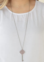 Load image into Gallery viewer, Encrusted in dazzling pink rhinestones, a shimmery silver key pendant swings from the bottom of a lengthened silver chain for a vintage inspired look. Features an adjustable clasp closure.  Sold as one individual necklace. Includes one pair of matching earrings.  Always nickel and lead free.  Life of the Party May 2020
