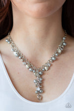Load image into Gallery viewer, A charming collection of silver pearls, metallic crystal-like beads, and ornate silver heart charms dangle below the collar. Featuring matching beads, an extended silver chain drips from the center for a vintage inspired look. Features an adjustable clasp closure.  Sold as one individual necklace. Includes one pair of matching earrings.  Always nickel and lead free.