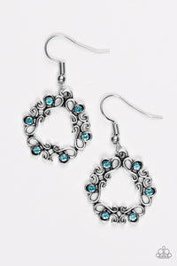 Glistening silver filigree joins into an airy wreath. Dainty blue rhinestones are sprinkled across the whimsical palette for a colorful finish. Earring attaches to a standard fishhook fitting.  Sold as one pair of earrings.  Always nickel and lead free.