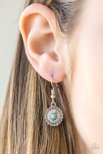 Load image into Gallery viewer, A dainty turquoise stone is pressed into a shimmery silver frame radiating with floral details for a seasonal look. Earring attaches to a standard fishhook fitting.  Sold as one pair of earrings.  Always nickel and lead free.