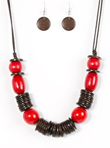 Brushed in a vibrant finish, red wooden beads and brown wooden discs are threaded along shiny brown cording for a summery look. Features an adjustable sliding knot closure.  Sold as one individual necklace. Includes one pair of matching earrings.